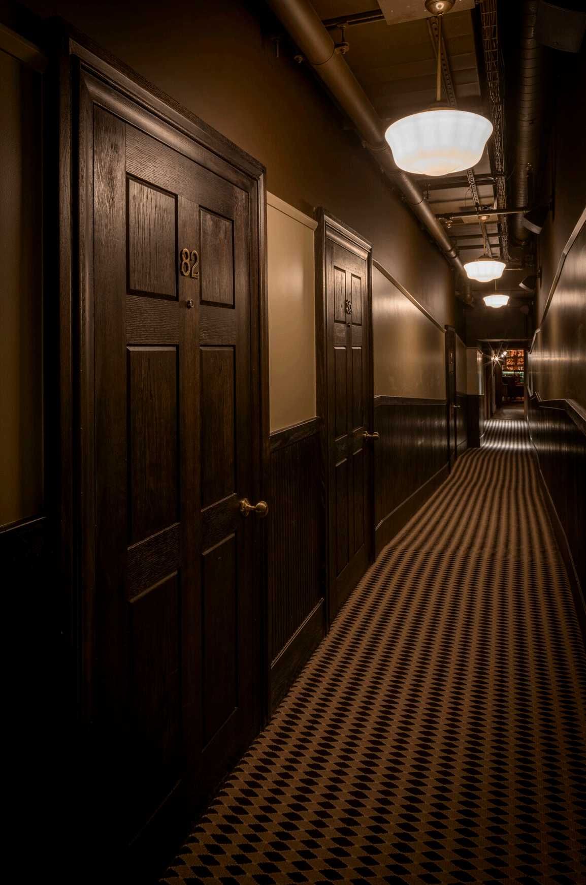 secret corridor leading to Nola's Speakeasy bar, London