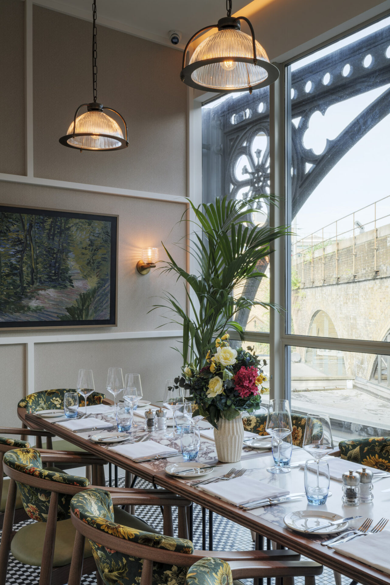 Private dining room view inside Roast Restaurant with a detail of the victorian Floral Hall facade facing the London Bridge train tracks