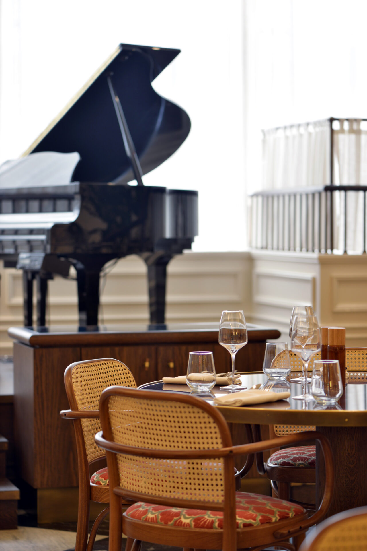 Elegant interior design of a live music restaurant featuring piano at Le Petit BeefBar Restaurant Edinburgh inside Hotel Intercontinental the George