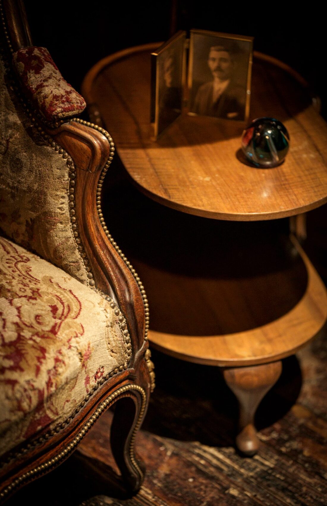 Reclaimed vintage upholstered chair, inside Good's Way music venue and events space in King's Cross, London, designed by 3Stories Interior Design and Branding creative agency